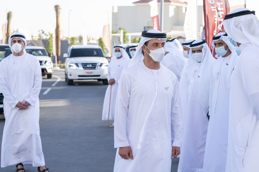 Hazza bin Zayed greets Al Samha team with Khaled bin Mohamed