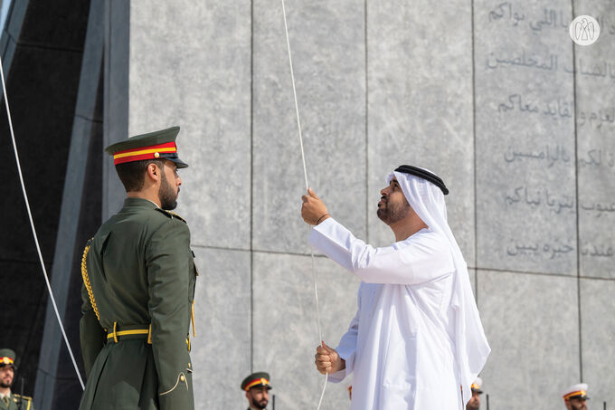 Theyab bin Mohamed bin Zayed raises UAE flag at Wahat Al Karama to mark UAE Flag Day 